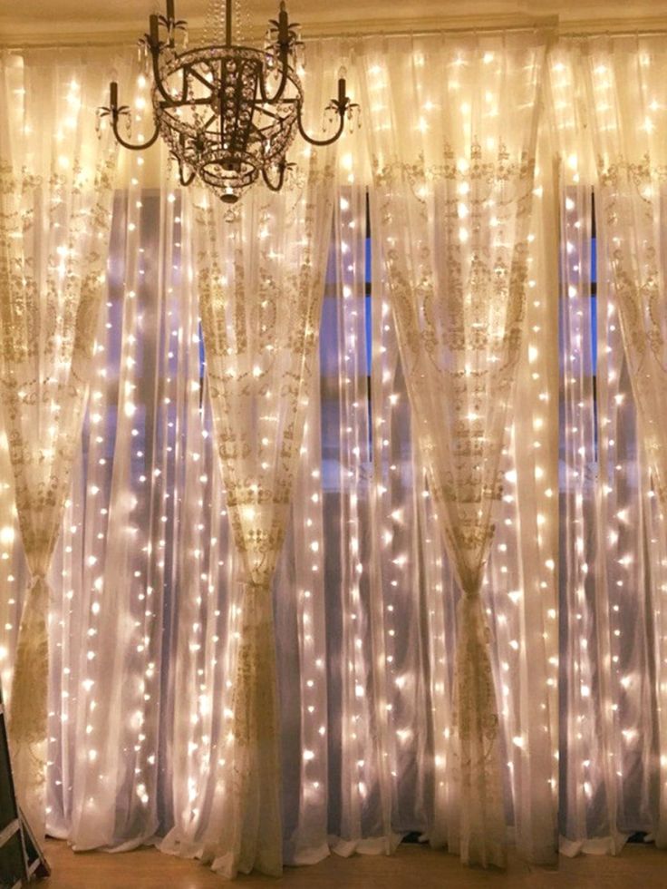 curtain of twinkle lights - Smartest Bedroom Gadget