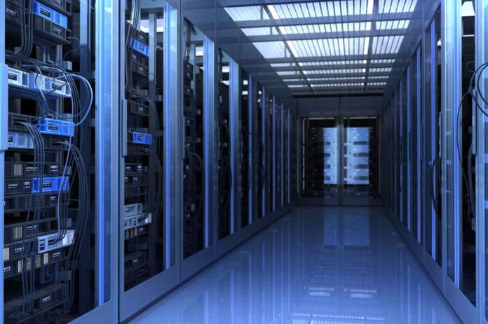 Futuristic data center with cloud icons and glowing server racks.