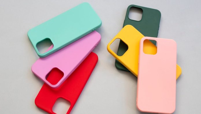 Colorful phone cases in various vibrant shades arranged on a flat surface.